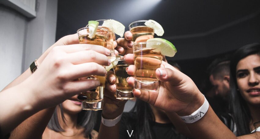 photo of people doing cheers