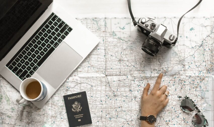 person pointing a location on the map