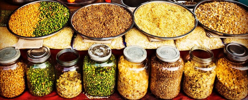 clear glass jars with assorted foods