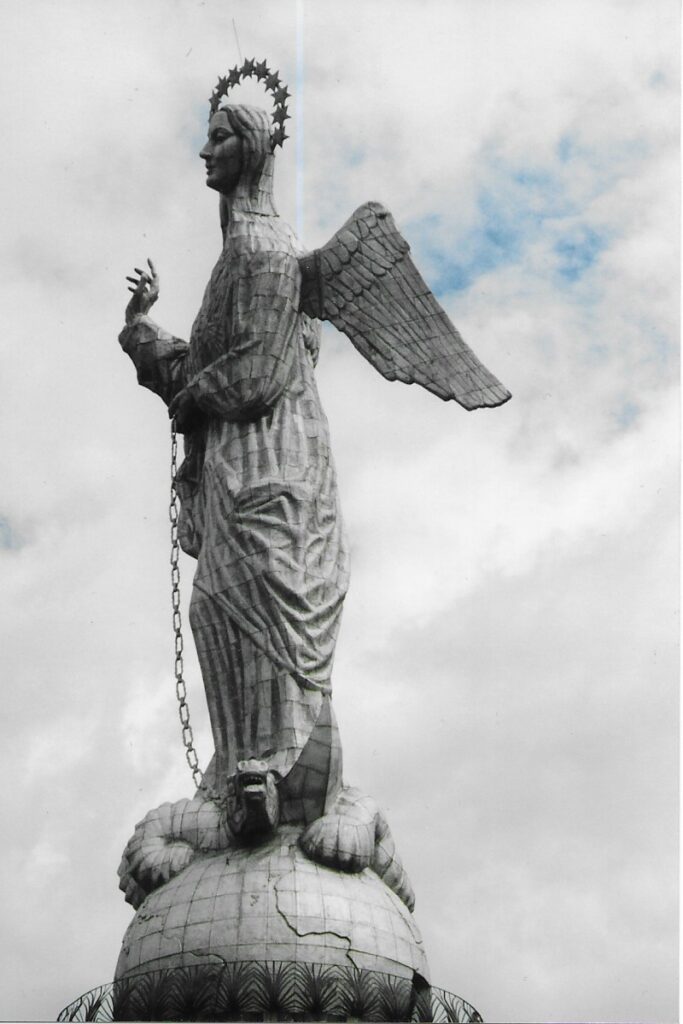 Ecuador travel writing. Close up shot of the Virgin of Quito sculpture
