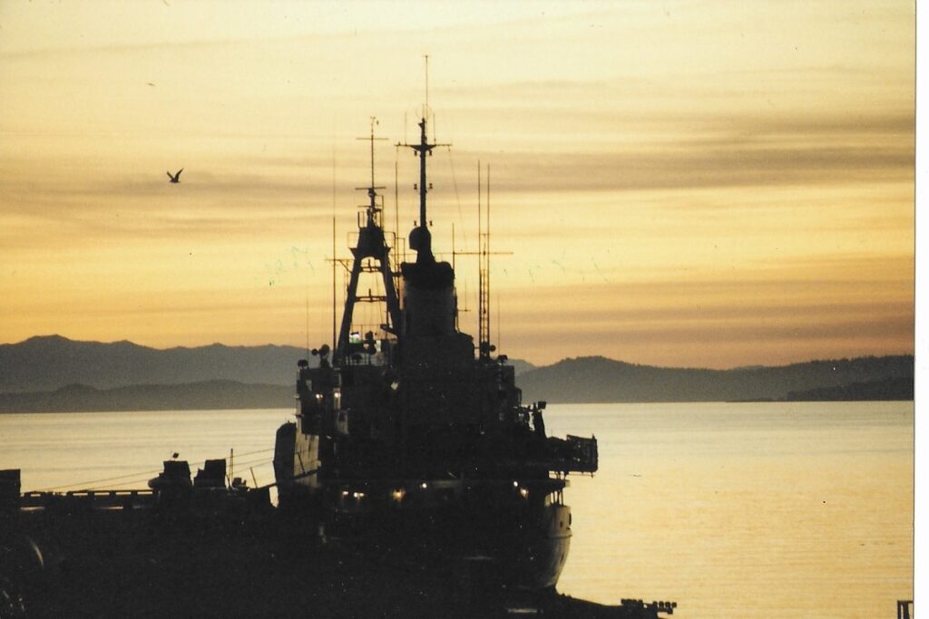 Silhouette of a radio communications boat on the waters edge in Victoria, Vancouver Island.